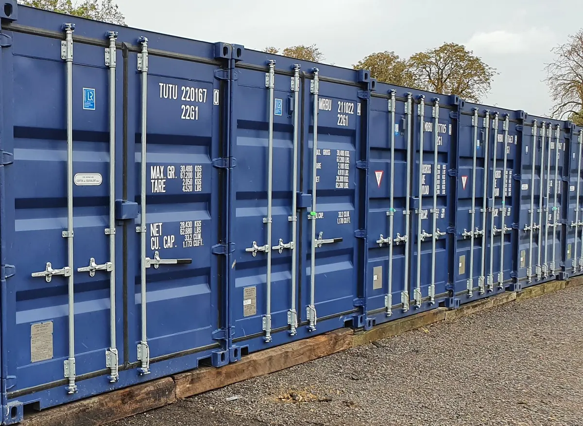 Row of blue drive-up storage containers at CamStorage, Bottisham